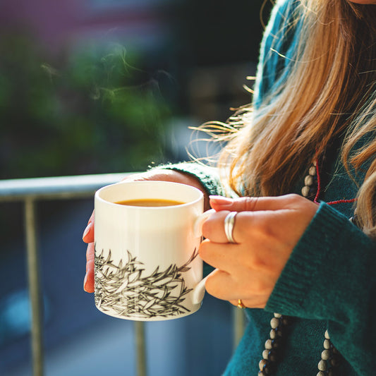 women drinking a mug of Speedy english breakfast tea with milk